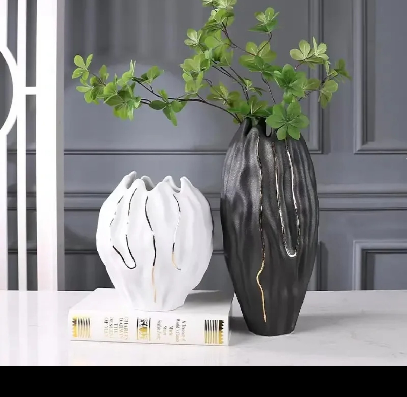 Gold and black tall set vase image